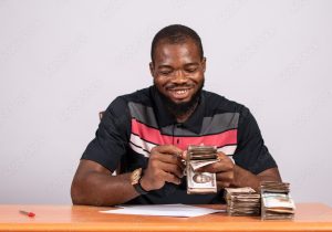 Igbo man Counting Money
